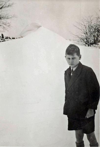 Robert Slater as a boy.jpg - Robert Slater as a young boy - snow of 1940.  ( Mr Slater has archived a vast number of photographs and documents relating to Long Preston over many years.  These have proved an invaluable resource for the Long Preston Heritage Group Project )  